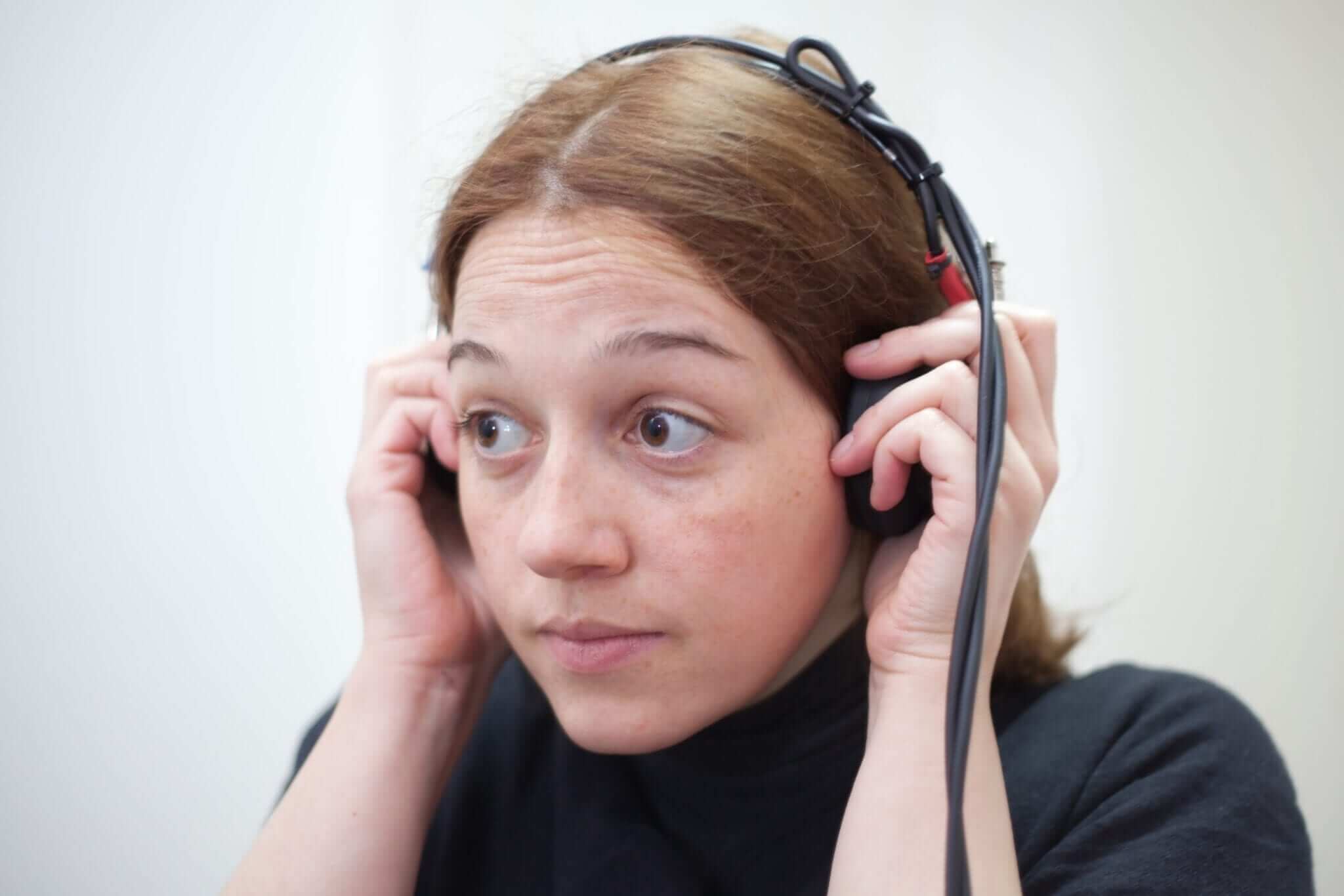 A young female undergoing hearing test at Sound Audiology & Hearing Aids